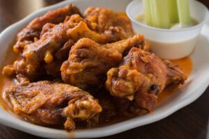 Read more about the article National Wing Day and beyond: Here’s 12 plates of drool-inducing wings from mild to ‘atomic’ on Staten Island